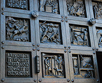Grossmunster Bronze Door Sculptures photo
