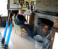 Signalman at his fireplace photo
