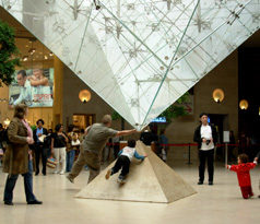 Kids and the Pyramid Louvre made famous by da vince code photo