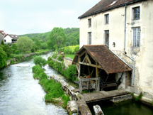 Driving European countryside France mill water wheel photo